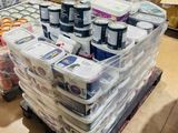 boxes of food are stacked on a pallet in a warehouse