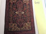 a picture of a book with a picture of a rug on it