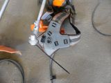someone is using a chainsaw to cut a piece of metal