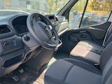 the interior of a van with the driver ' s seat down