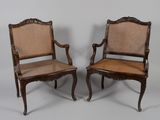 paire de chaises anciennes à dossier et accoudoirs en rotin