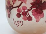 a glass bowl with flowers painted on it