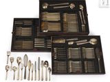 many different types of silverware in this box