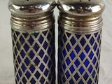 pair of silver and blue glass salt and pepper shakers