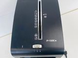 a black toaster sitting on top of a white counter