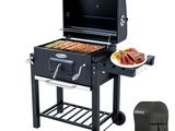 a barbecue grill with a plate of food on it