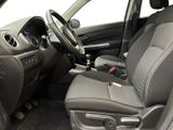 the interior of a car with a steering wheel and a dashboard