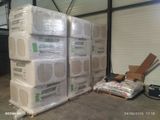 many boxes of air conditioners stacked on top of each other
