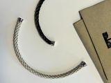 a box that has a rope around it on a table