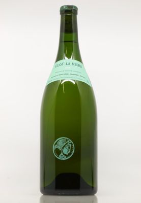a bottle of wine that is sitting on a table