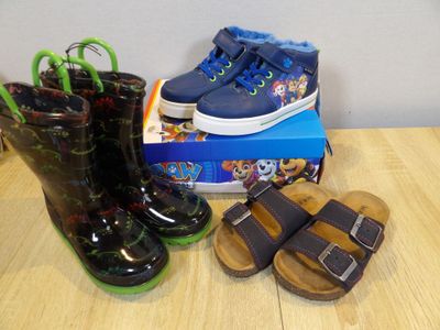 a pair of shoes and a pair of shoes on a table