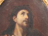 an old painting of a man with a beard and a red cape