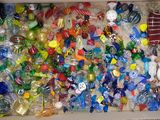a box full of assorted christmas ornaments in it