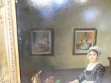 un tableau représentant une femme assise à une table avec des fleurs