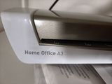 a close up of a home office printer on a desk