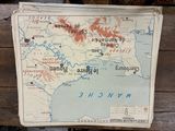 a map on the wall of a building that has a map of france on it