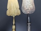 three different types of knives on a black surface