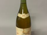 a bottle of wine that is sitting on a table
