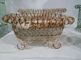 a metal basket that is sitting on a table