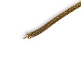 bracelet made of gold plated metal on a white background
