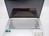 a laptop computer that is sitting on a table