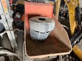 an image of a pile of construction equipment in a garage