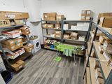 a room filled with lots of boxes and shelves