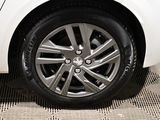 a close up of a car tire on the floor