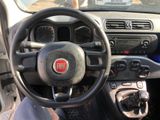 dashboard of a car with a steering wheel and dashboard controls