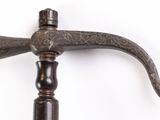 a close up of an old hammer on a white background