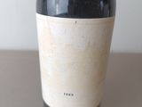 a bottle of wine that is sitting on a table