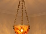a light that is hanging from the ceiling in the room