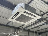 a air conditioner hanging from the ceiling in a building