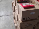 several boxes of books are stacked on top of each other in a warehouse