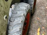a tractor that is parked on the side of the road