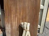 a pair of pliers sitting on the ground next to a door
