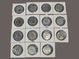 a lot of different types of coins in a box
