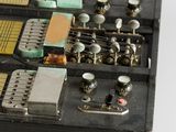 a close up of a small electronic device on a table