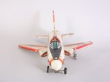 a toy airplane that is sitting on a white surface