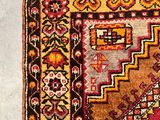 a rug on the floor with a cat on it