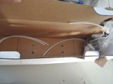 a cardboard box with a pair of shoes inside of it