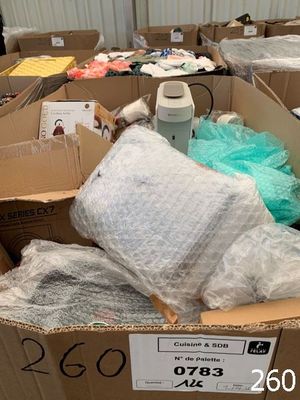 a cardboard box filled with lots of items in it