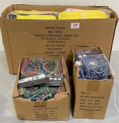 several boxes of assorted items are sitting on the floor