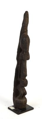 statue of a man with a hat on his head on a black base