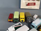 a lot of toy cars that are sitting on a table