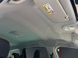 the interior of a car with a no parking sign on the side of it