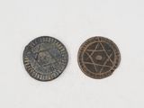 two coins with a star of david and a star of david on them
