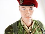 a man in a military uniform posing for a picture