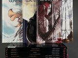 books are stacked on top of each other on a table