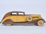 a toy car that is sitting on a white surface